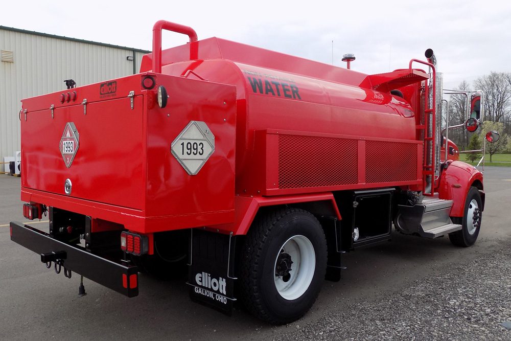 red water truck rear passenger side view